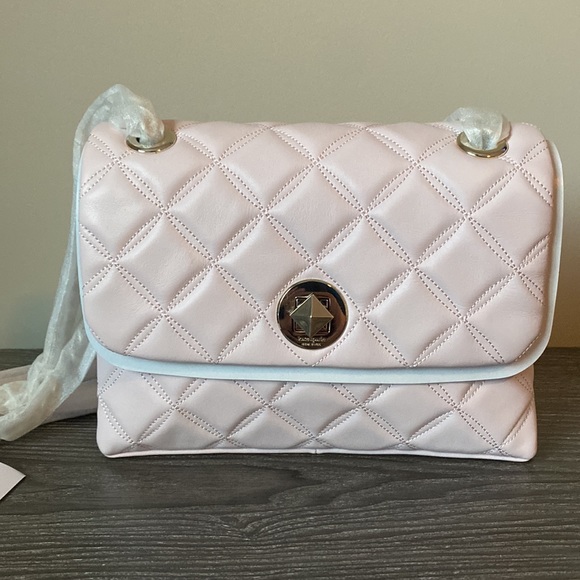 Small chalk pink Natalia cross body bag with tags attached and packaged. - Picture 3 of 6